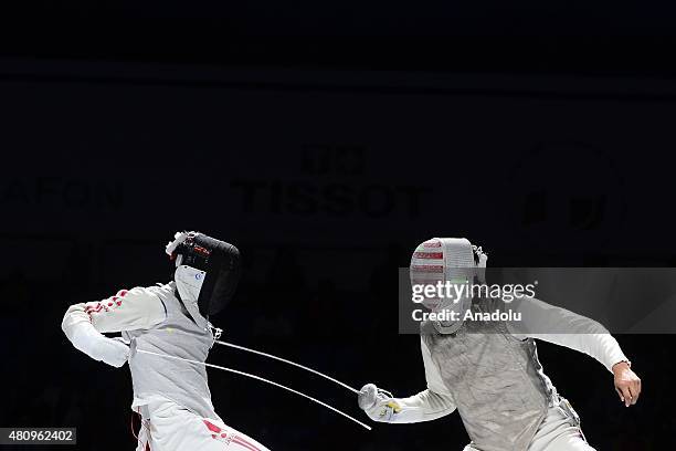 Yuki Ota of Japan competes with Alexander Massialas of United States during the Man's Senior Fleuret final match within the 2015 World Fencing...