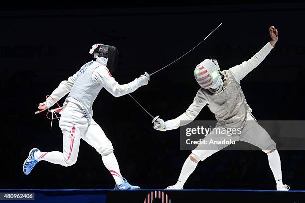 Yuki Ota of Japan competes with Alexander Massialas of United States during the Man's Senior Fleuret final match within the 2015 World Fencing...