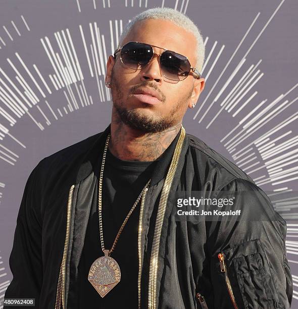 Singer Chris Brown arrives at the 2014 MTV Video Music Awards at The Forum on August 24, 2014 in Inglewood, California.