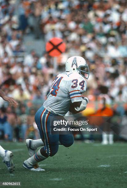 Earl Campbell of the Houston Oilers carries the ball against the Washington Redskins during an NFL football game September 2, 1979 at RFK Stadium in...