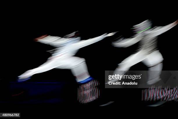 Yuki Ota of Japan competes with Alexander Massialas of United States during the Man's Senior Fleuret final match within the 2015 World Fencing...