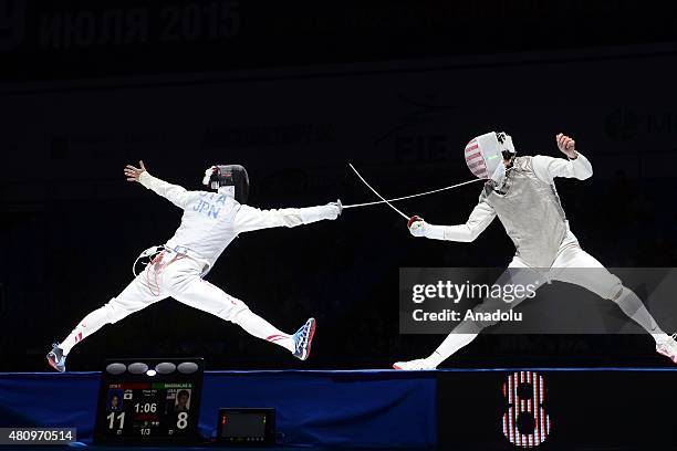 Yuki Ota of Japan competes with Alexander Massialas of United States during the Man's Senior Fleuret final match within the 2015 World Fencing...