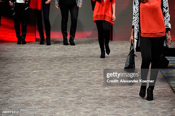 Models walk the runway during the Ernsting's family Fashion Show Autumn/Winter 2015 at Hotel Atlantic on July 16, 2015 in Hamburg, Germany.