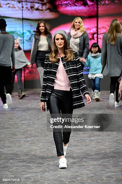 Models walk the runway during the Ernsting's family Fashion Show Autumn/Winter 2015 at Hotel Atlantic on July 16, 2015 in Hamburg, Germany.