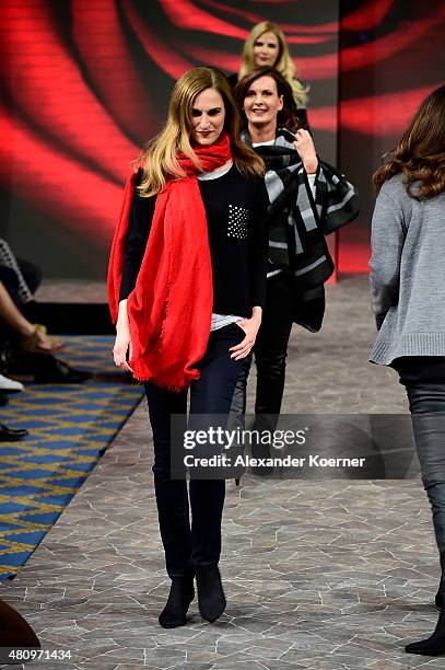 Models walk the runway during the Ernsting's family Fashion Show Autumn/Winter 2015 at Hotel Atlantic on July 16, 2015 in Hamburg, Germany.