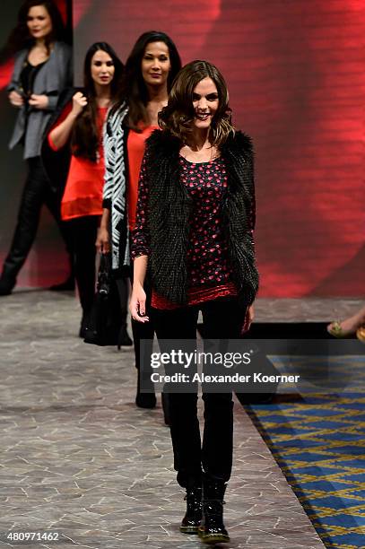 Models walk the runway during the Ernsting's family Fashion Show Autumn/Winter 2015 at Hotel Atlantic on July 16, 2015 in Hamburg, Germany.