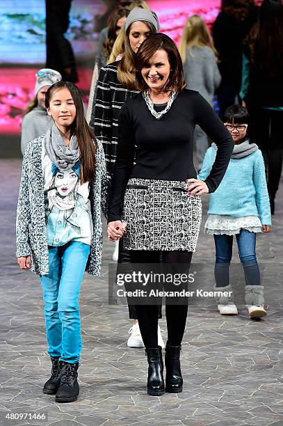 Astrid Rudolph walks the runway during the Ernsting's family Fashion Show Autumn/Winter 2015 at Hotel Atlantic on July 16, 2015 in Hamburg, Germany.