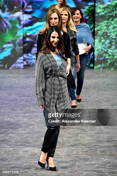 Sila Sahin walks the runway during the Ernsting's family Fashion Show Autumn/Winter 2015 at Hotel Atlantic on July 16, 2015 in Hamburg, Germany.