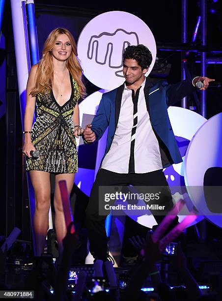 Actress Bella Thorne and actor Tyler Posey co-host the MTV Fandom Fest San Diego Comic-Con at PETCO Park on July 9, 2015 in San Diego, California.