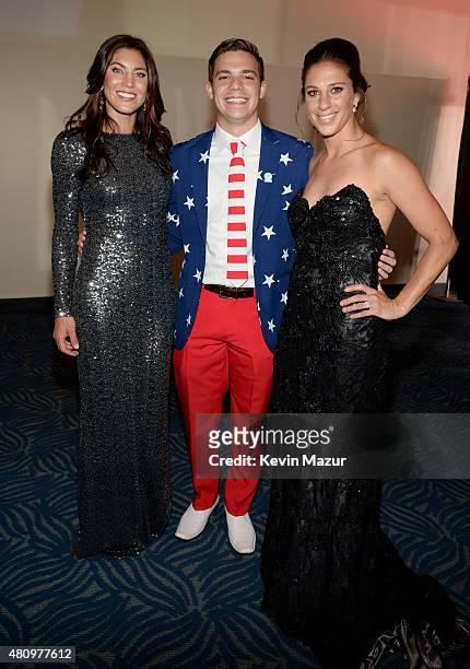 Hope Solo, Zachary Mazur and Carli Lloyd attend the 2015 ESPYS on July 15, 2015 in Los Angeles, California.