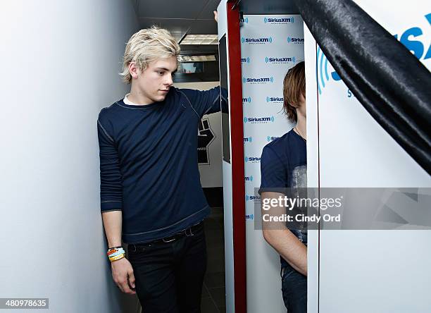 Ross Lynch and Rocky Lynch of R5 pose in the SiriusXM photo booth at the SiriusXM Studios on March 27, 2014 in New York City.