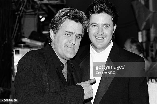 Pictured: Guest host Jay Leno and musical guest Vince Gill on March 5, 1991 --