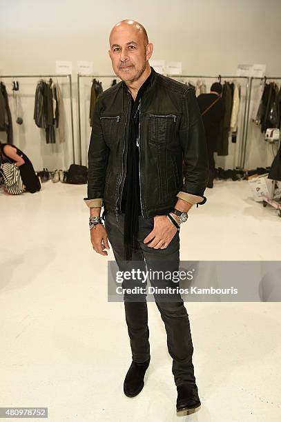 Designer John Varvatos poses backstage at the John Varvatos S/S 2016 runway show during New York Fashion Week: Men's at Skylight Clarkson Sq on July...