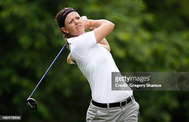 Amy Anderson watches her tee shot on the ninth hole during the first round of the Marathon Classic presented by Owens Corning and O-I at Highland...