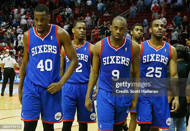 Jarvis Varnado, James Nunnally, James Anderson and Elliot Williams of the Philadelphia 76ers walk off the court after losing to the Houston Rockets...