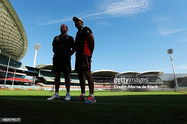 Ken Hinkley of Port Adelaide Power and Brenton Sanderson of the Adelaide Crows pose for a photograph after an AFL press conference at Adelaide Oval...