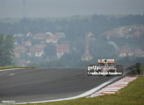 Ayrton Senna of Brazil drives the Honda Marlboro McLaren McLaren MP4/5 Honda RA109A V10 during practice for the Hungarian Grand Prix on 12th August...