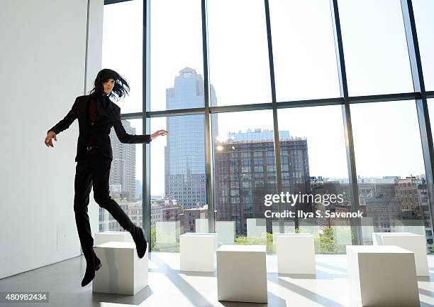 Models pose at the J. Lindeberg presentation during New York Fashion Week: Men's S/S 2016 at Spring Studios on July 16, 2015 in New York City.