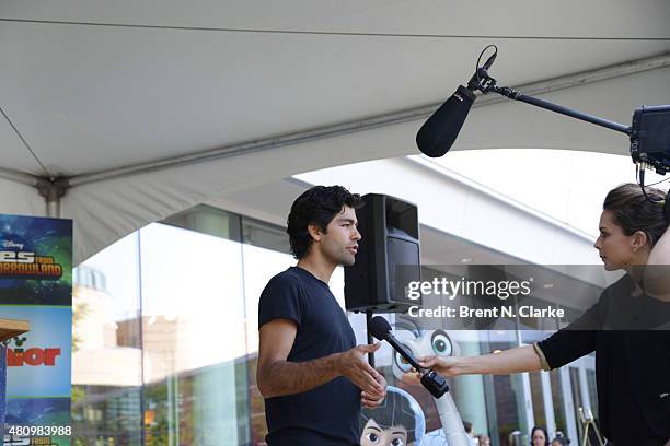 Actor Adrian Grenier speaks to the media during the "Miles from Tomorrowland: Space Missions" kick off event held at New York Hall Of Science on July...