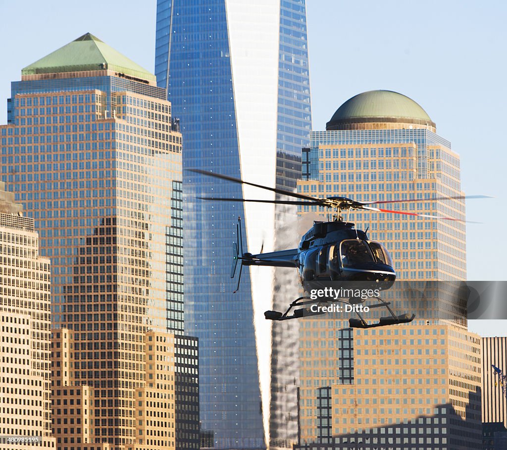 Close up of helicopter and office buildings, New York, USA