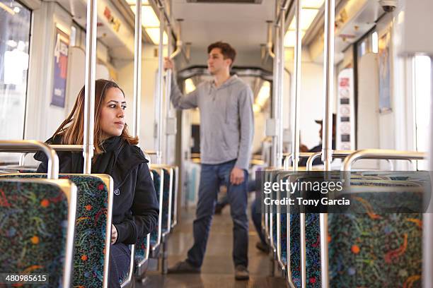 commuters on empty subway train - no pants subway stock pictures, royalty-free photos & images