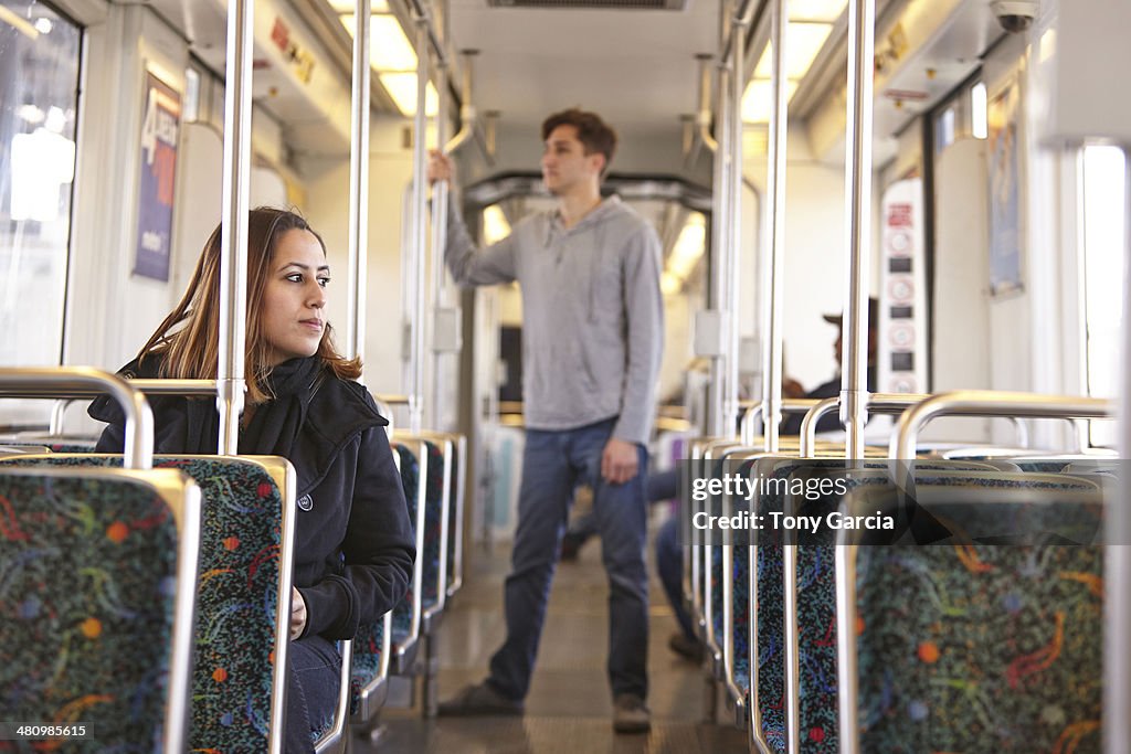 Commuters on empty subway train