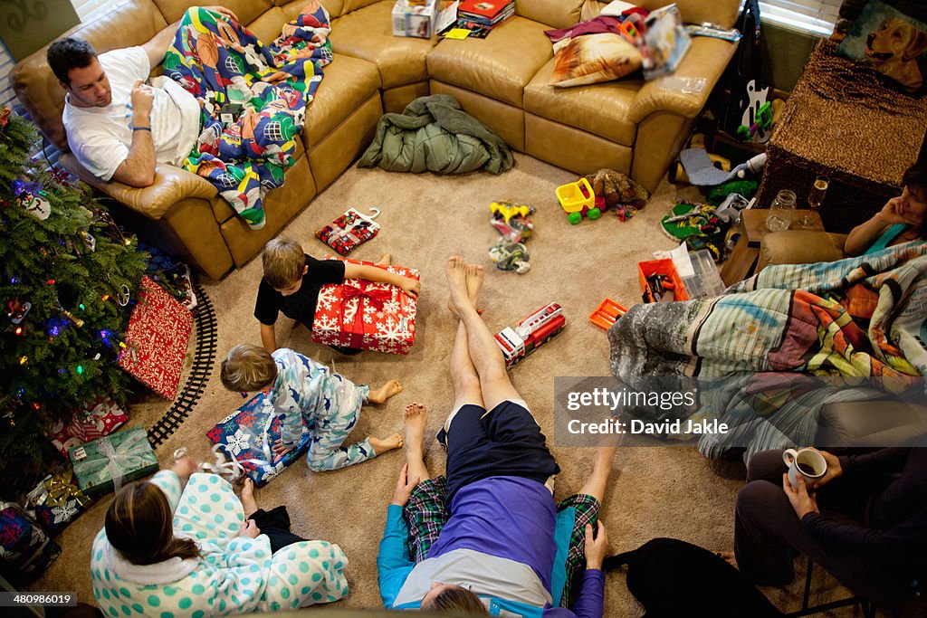 Young brothers opening gifts on xmas day