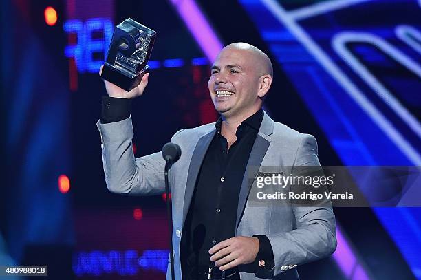 Pitbull accepts award onstage at Univision's Premios Juventud 2015 at Bank United Center on July 16, 2015 in Miami, Florida.