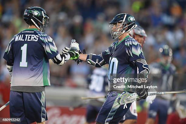 Joe Walters and Matt Danowski celebrate a goal in the second period during a MLL Lacrosse game against the Boston Cannons at Navy-Marine Corps...