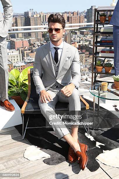 Model Ryan Allan poses at the Hickey Freeman presentation during New York Fashion Week: Men's S/S 2016 at The Standard, East Village on July 16, 2015...