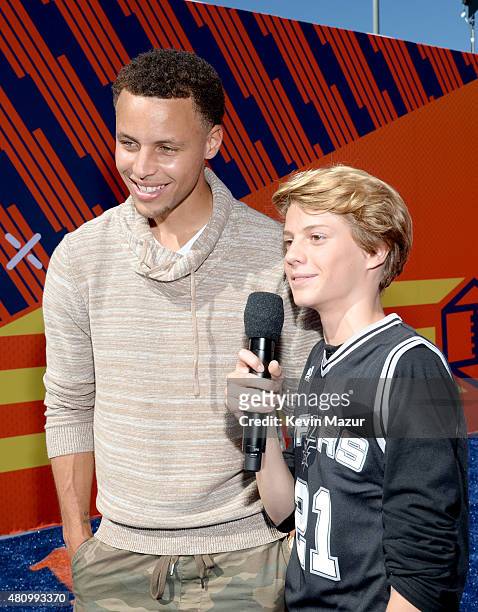 Player Stephen Curry and actor Jace Norman attend the Nickelodeon Kids' Choice Sports Awards 2015 at UCLA's Pauley Pavilion on July 16, 2015 in...