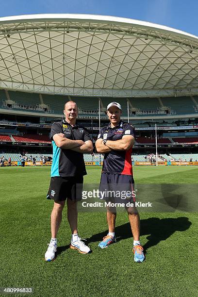 Ken Hinkley of Port Adelaide Power and Brenton Sanderson of the Adelaide Crows pose for a photograph after an AFL press conference at Adelaide Oval...