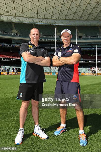 Ken Hinkley of Port Adelaide Power and Brenton Sanderson of the Adelaide Crows pose for a photograph after an AFL press conference at Adelaide Oval...