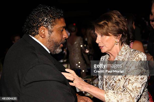 Rev. Dr. William Barber talks with U.S. House Minority Leader Rep. Nancy Pelosi at the Planned Parenthood Federation Of America's 2014 Gala Awards...