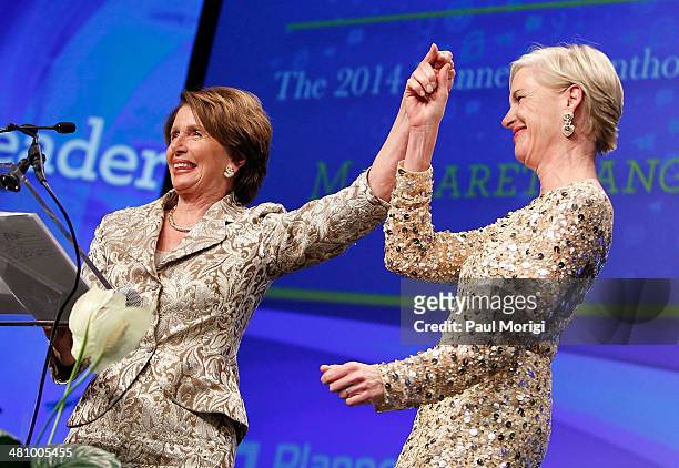 Planned Parenthood Federation of America President Cecile Richards presents U.S. House Minority Leader Rep. Nancy Pelosi with the Margaret Sanger...