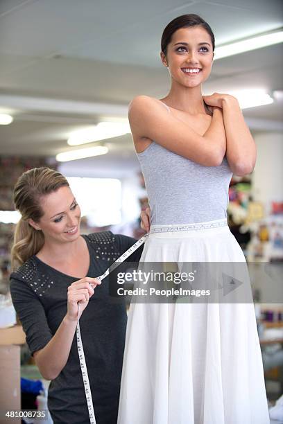 super seamstress at work - seam stockfoto's en -beelden