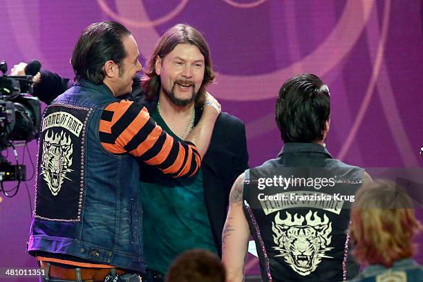 Rea Garvey and The BossHoss attend the Echo Award 2014 show on March 27, 2014 in Berlin, Germany.