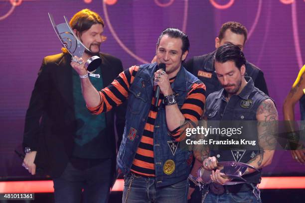 Rea Garvey and The BossHoss attend the Echo Award 2014 show on March 27, 2014 in Berlin, Germany.