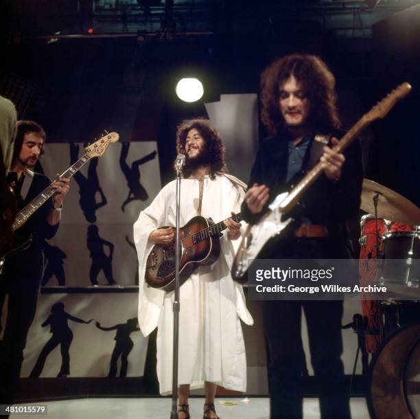 British-American rock group Fleetwood Mac perform on television, London, England, 1969. Pictured are, from left, John McVie, Peter Green, and Jeremy...