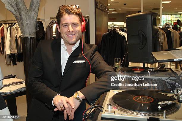 Jon Abrahams DJ's at the J. Lindeberg, Art Of Elysium and GQ Host Event At Saks Fifth Avenue at Saks Fifth Avenue Beverly Hills on March 27, 2014 in...