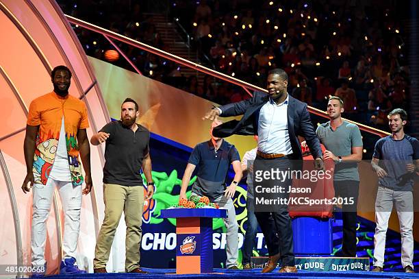 Player Andre Drummond and NFL player DeMarco Murray play a game onstage at the Nickelodeon Kids' Choice Sports Awards 2015 at UCLA's Pauley Pavilion...
