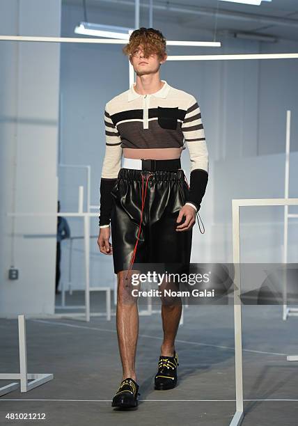 Model walks the runway at the Edmund Ooi fashion show during New York Fashion Week: Men's S/S 2016 on July 16, 2015 in New York City.