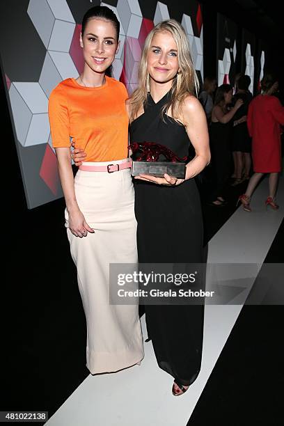 Lena Meyer-Landruth, Caro Daur with award during the New Faces Award Fashion 2015 on July 16, 2015 at P1 in Munich, Germany.