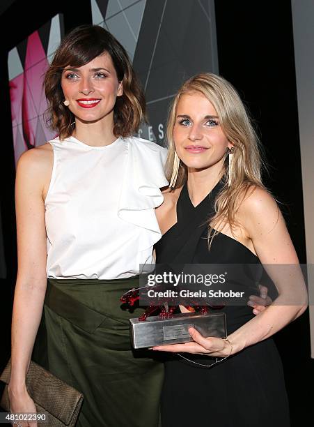 Eva Padberg and winner Caro Daur during the New Faces Award Fashion 2015 on July 16, 2015 at P1 in Munich, Germany.