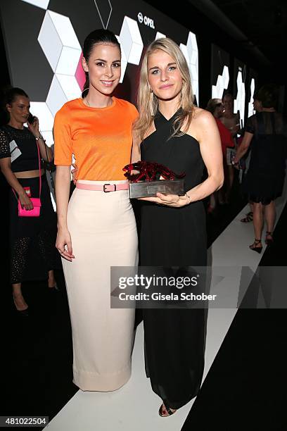 Lena Meyer-Landruth, Caro Daur with award during the New Faces Award Fashion 2015 on July 16, 2015 at P1 in Munich, Germany.