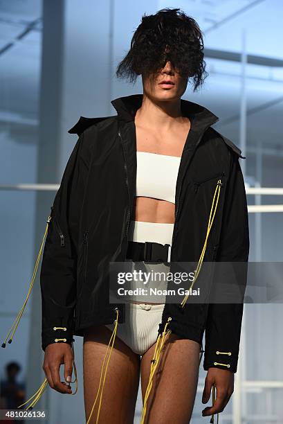 Model walks the runway at the Edmund Ooi fashion show during New York Fashion Week: Men's S/S 2016 on July 16, 2015 in New York City.