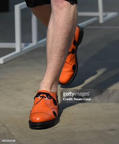 Model, shoe detail, walks the runway at the Edmund Ooi fashion show during New York Fashion Week: Men's S/S 2016 on July 16, 2015 in New York City.