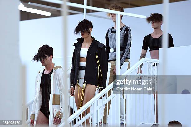 Models walk the runway at the Edmund Ooi fashion show during New York Fashion Week: Men's S/S 2016 on July 16, 2015 in New York City.