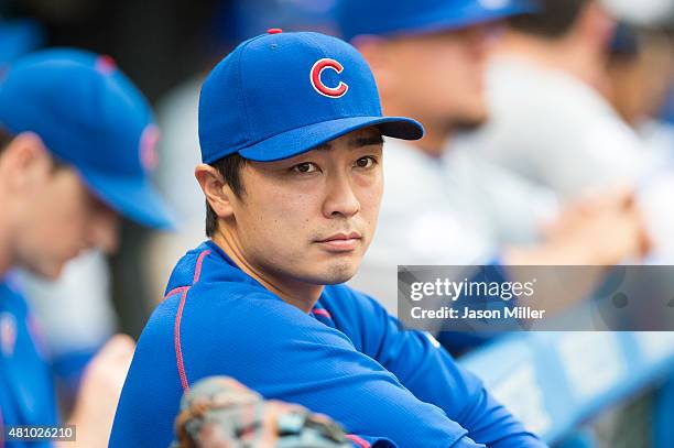 Pitcher Tsuyoshi Wada of the Chicago Cubs watches the game from the dugout during the first inning against the Cleveland Indians at Progressive Field...