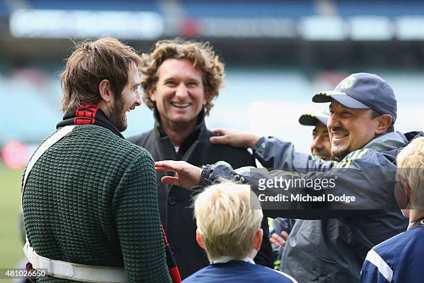 Jobe Watson of the Essendon Bombers and Bombers head coach James Hird react with Real Mardid Head Manager Rafa Benitez after a Real Madrid training...